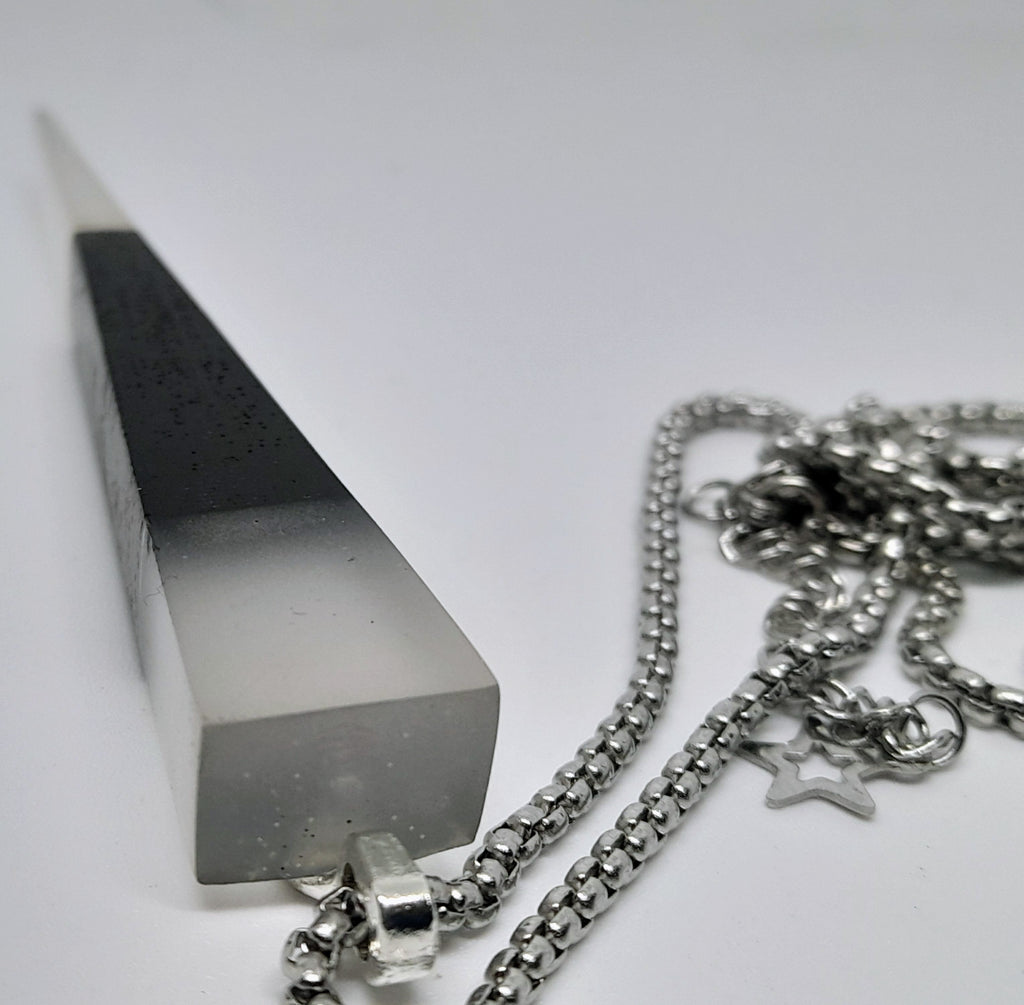 Handmade Irish Bog Oak Dagger Pendant – Glow-in-the-Dark Cyan Resin | Titanium Plated Chain