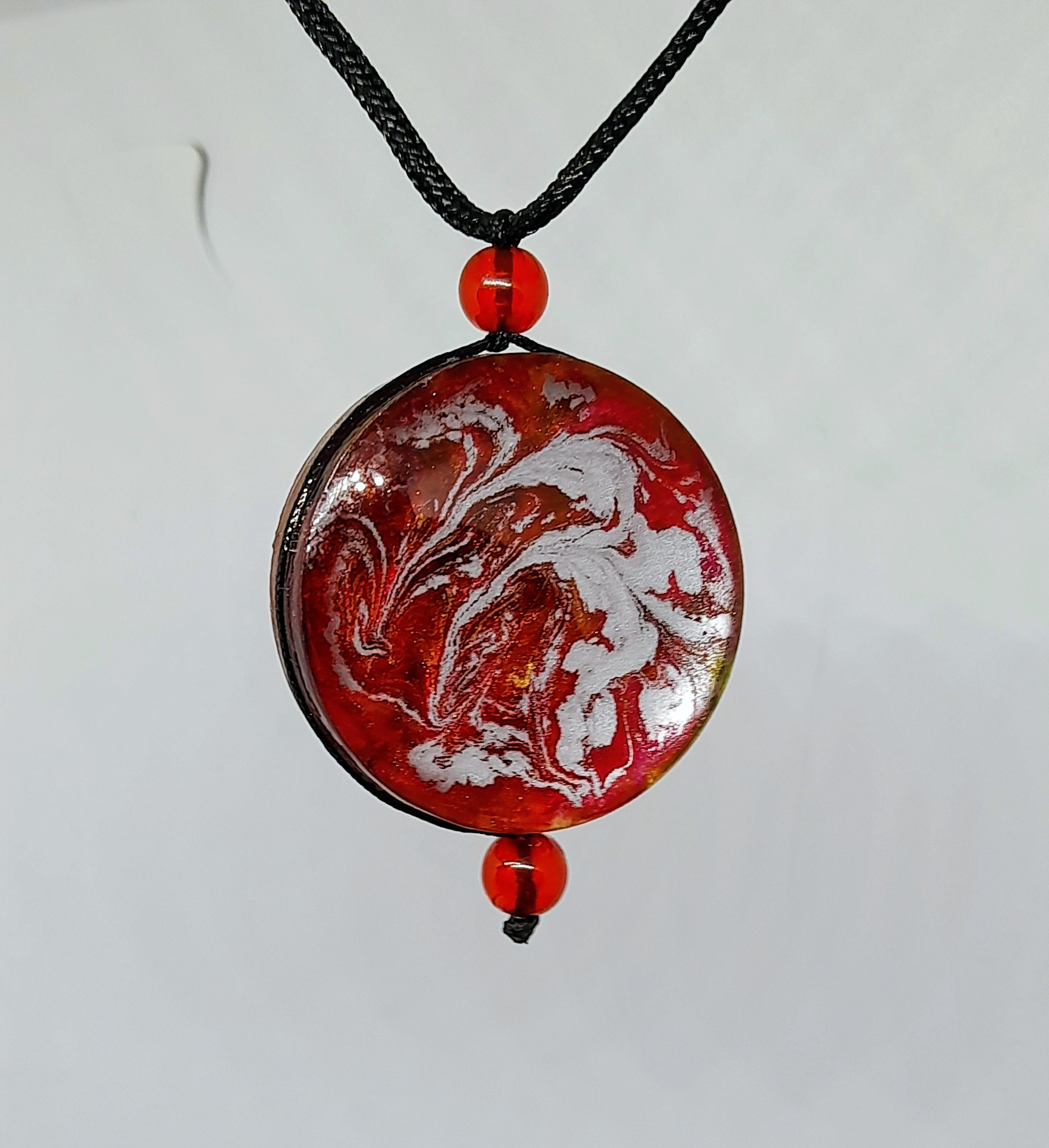 Double sided swirl necklace