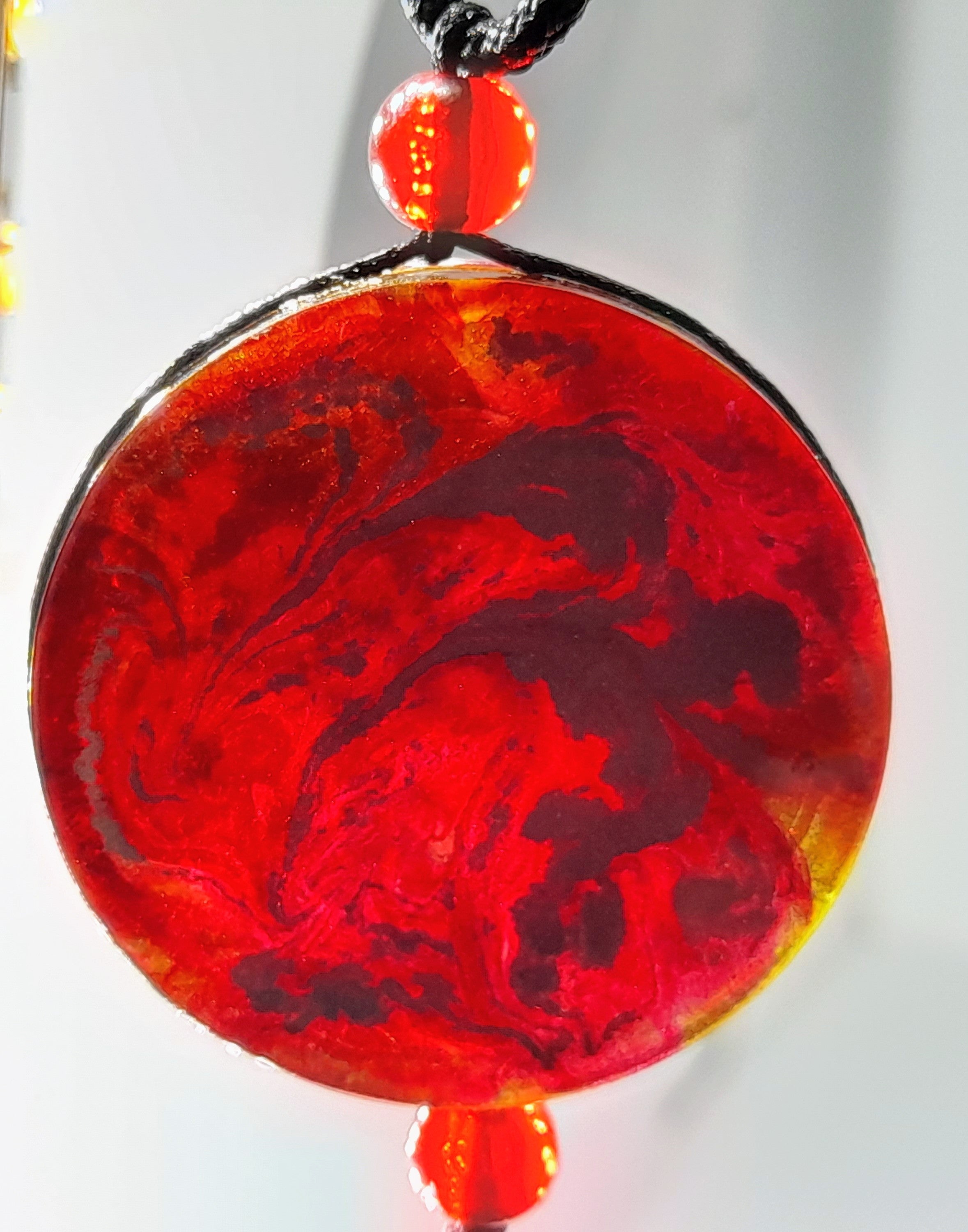 Double sided swirl necklace