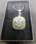 Handmade Irish Green Stone Pendant – Celtic Swirl Design | Black Cord