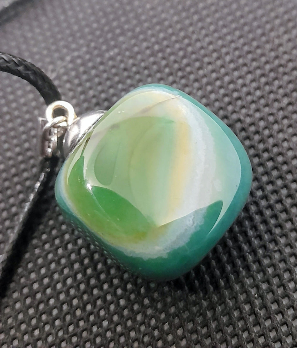 Handmade Irish Green Stone Pendant – Celtic Swirl Design | Black Cord