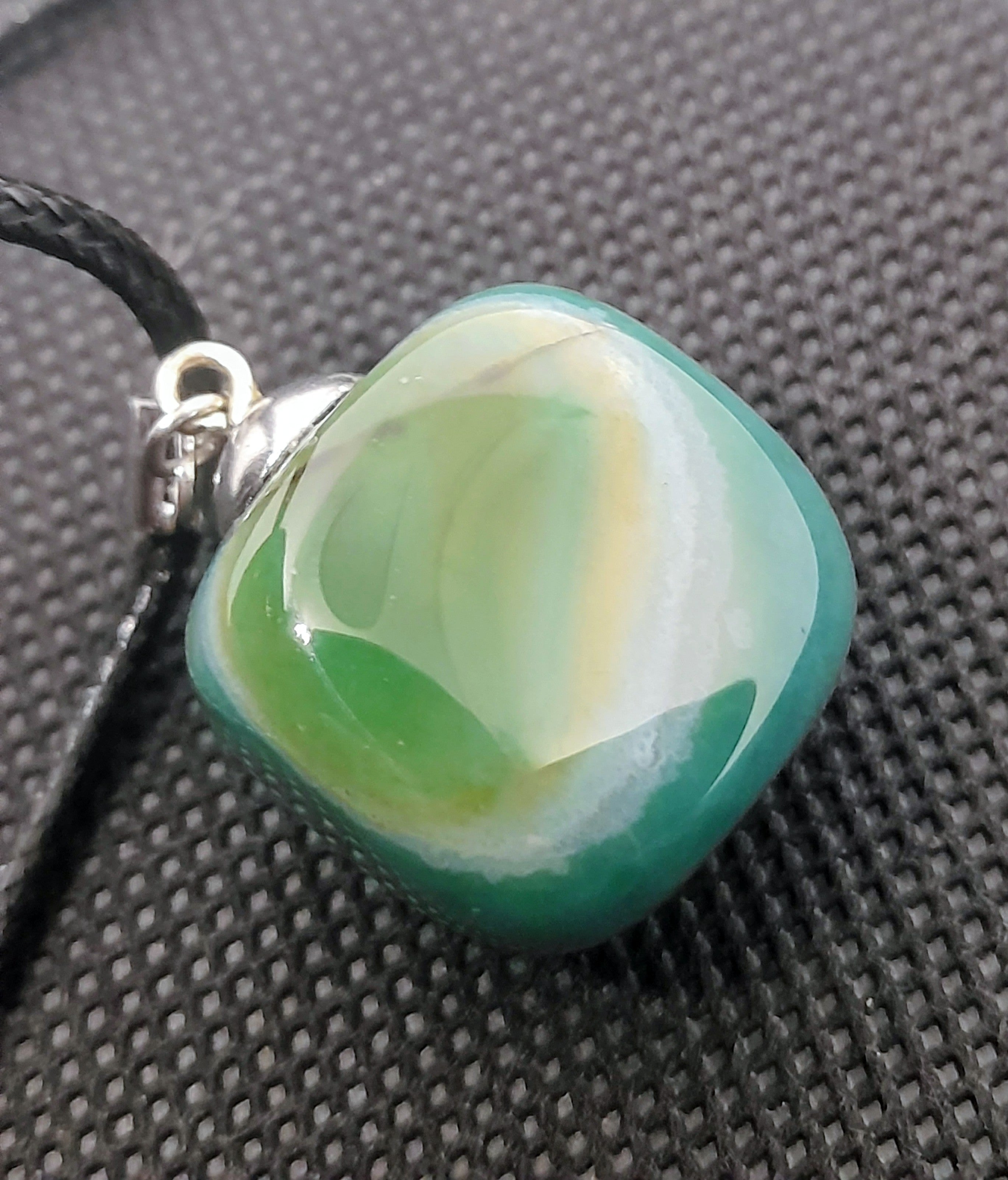 Handmade Irish Green Stone Pendant – Celtic Swirl Design | Black Cord