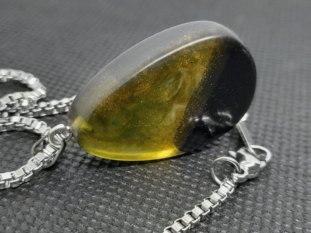 Handmade Irish Bog Oak Teardrop Pendant – Sealed in Yellow-Green Resin | Silver Chain