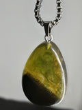 Handmade Irish Bog Oak Teardrop Pendant – Sealed in Yellow-Green Resin | Silver Chain