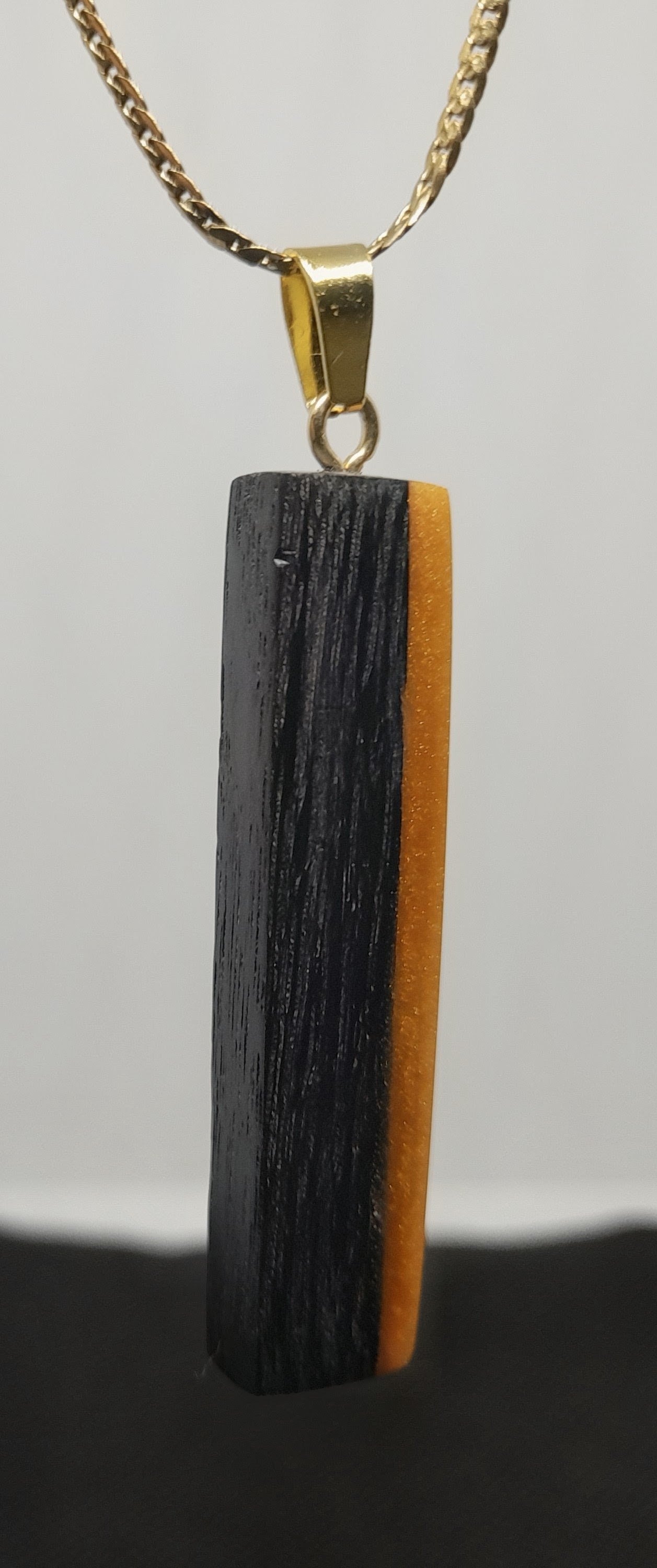 Handmade Irish Bog Oak Bar Pendant – Golden Amber Resin | Gold stainless steel chain
